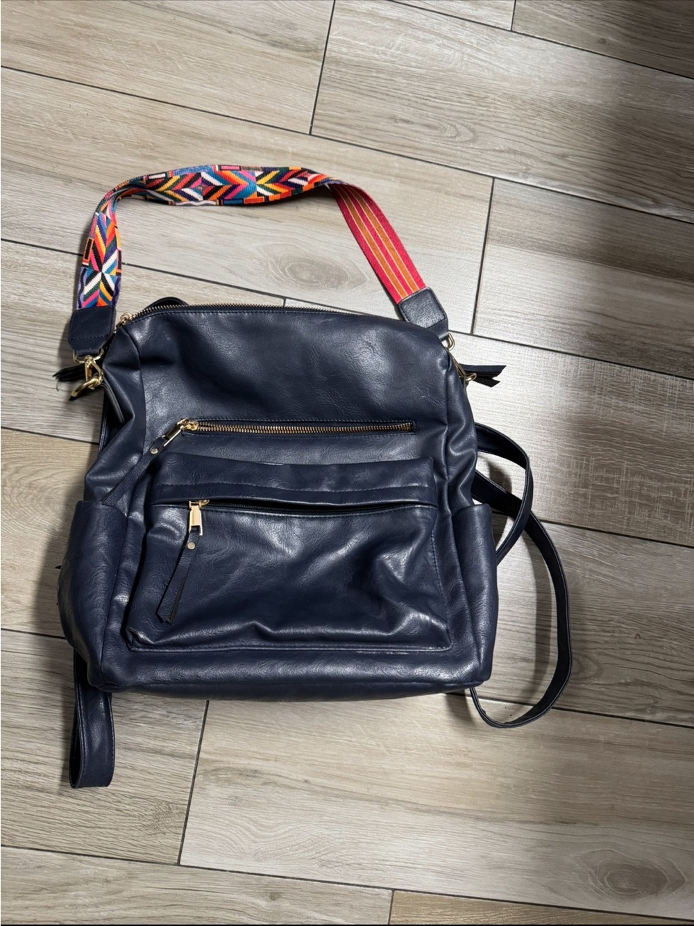 Navy Leather Crossbody Backpack with Colorful Strap